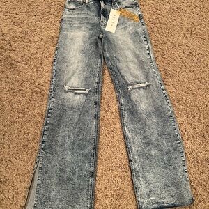 Risen Faded Denim Jeans
